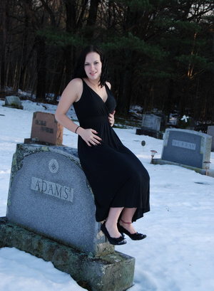 18 year old girl Katie Lewis stands naked after undressing in her bedroom